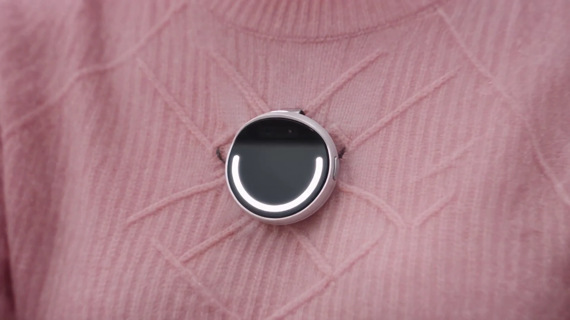EgoClip worn on a pink sweater